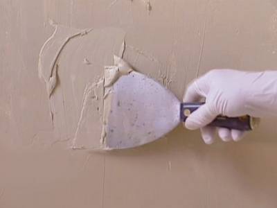 Repair chips or indentations in painted plaster